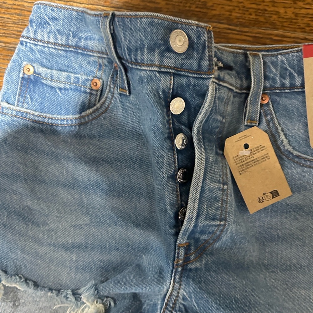 Levi's Women's Distressed Blue Jean Shorts - Picture 4 of 9